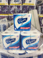 8 pack Papex toilet paper rolls stacked with a clear plastic wrap in a warehouse setting.